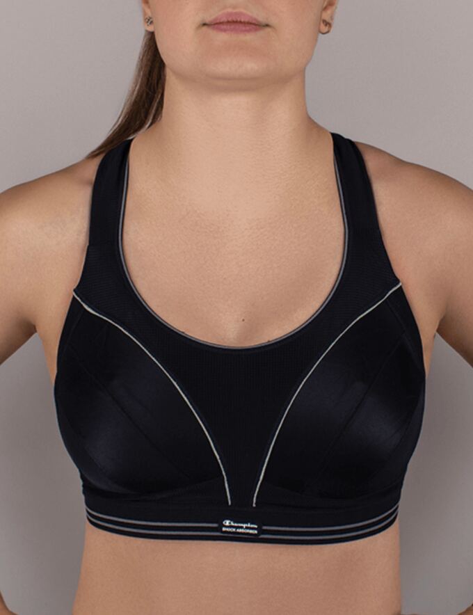 A racerback sports bra with straps joined in the centre of the back